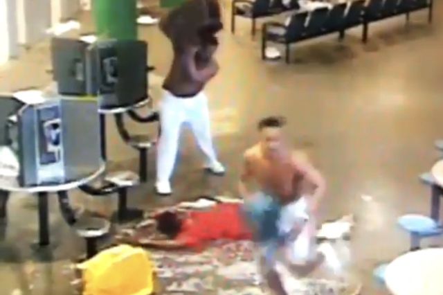 Video still of inmates assaulting another at Newark Jail